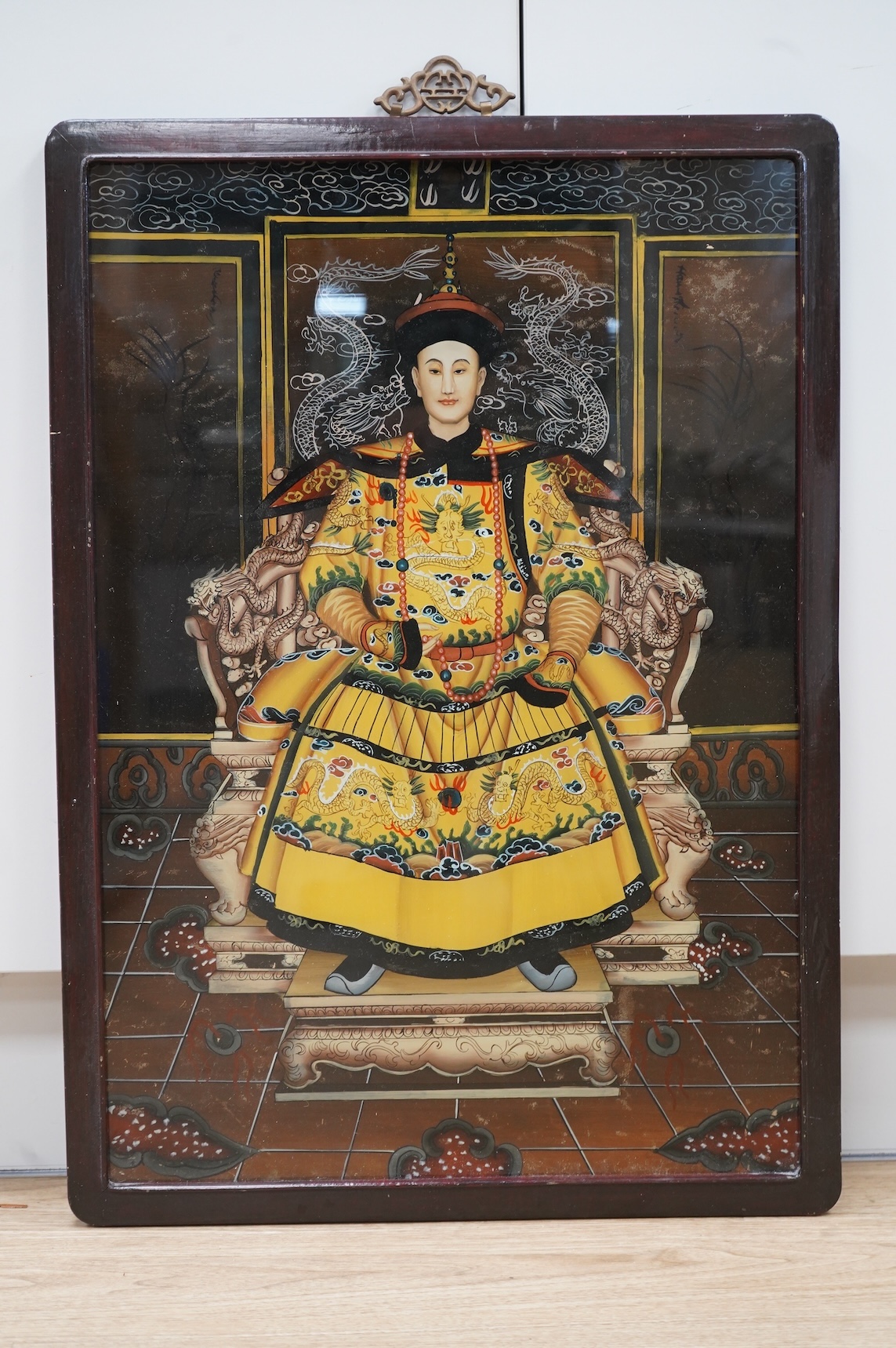 Chinese School, 20th century, Ancestral portrait, reverse glass painted panel, 63 x 43cm, framed